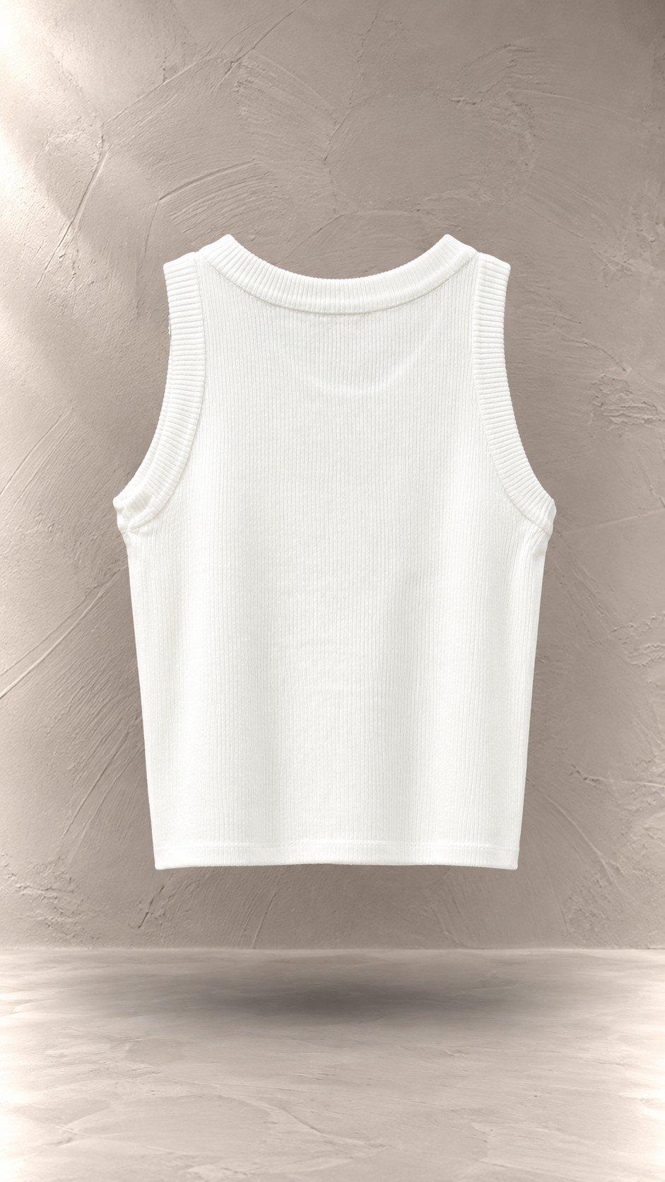 تاپ کراپ کبریتی بافت‌دار بدون آستین یقه گرد معلق در پس‌زمینه مینیمال بتنی | Ribbed sleeveless crop tank top with round neck floating against a minimalist textured background