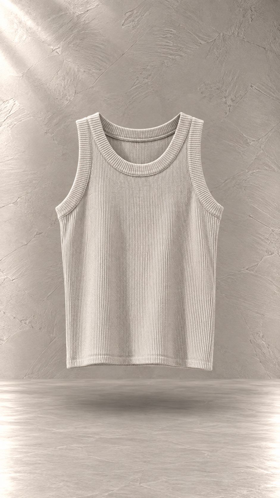 تاپ کراپ کبریتی بافت‌دار بدون آستین یقه گرد معلق در پس‌زمینه مینیمال بتنی | Ribbed sleeveless crop tank top with round neck floating against a minimalist textured background