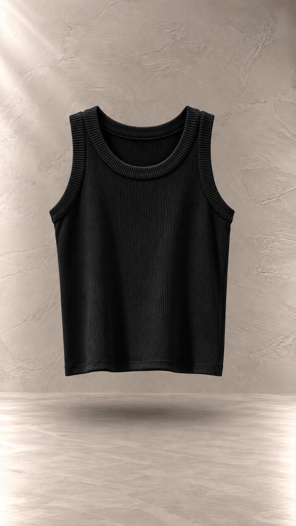 تاپ کراپ کبریتی بافت‌دار بدون آستین یقه گرد معلق در پس‌زمینه مینیمال بتنی | Ribbed sleeveless crop tank top with round neck floating against a minimalist textured background