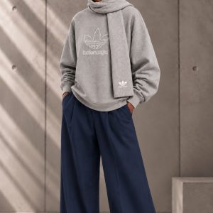 سویشرت یقه اسکی با شال متصل آدیداس بالنسیاگا، دارای لوگوی ترکیبی و بافت نرم | Adidas x Balenciaga attached scarf sweatshirt featuring co-branded logo and soft textured knit