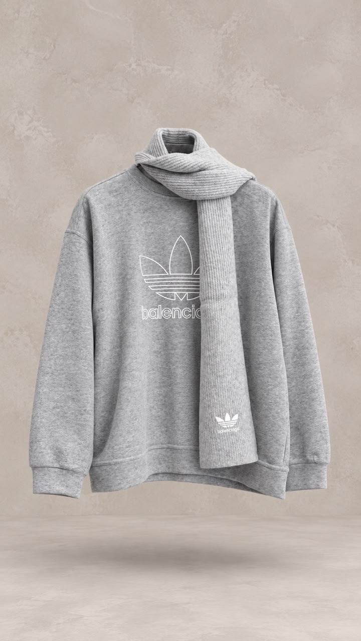 سویشرت یقه اسکی با شال متصل آدیداس بالنسیاگا، دارای لوگوی ترکیبی و بافت نرم | Adidas x Balenciaga attached scarf sweatshirt featuring co-branded logo and soft textured knit